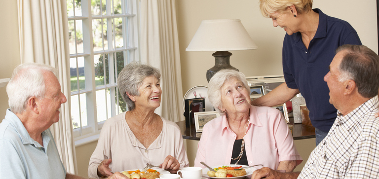 Caregiver assisting a senior client